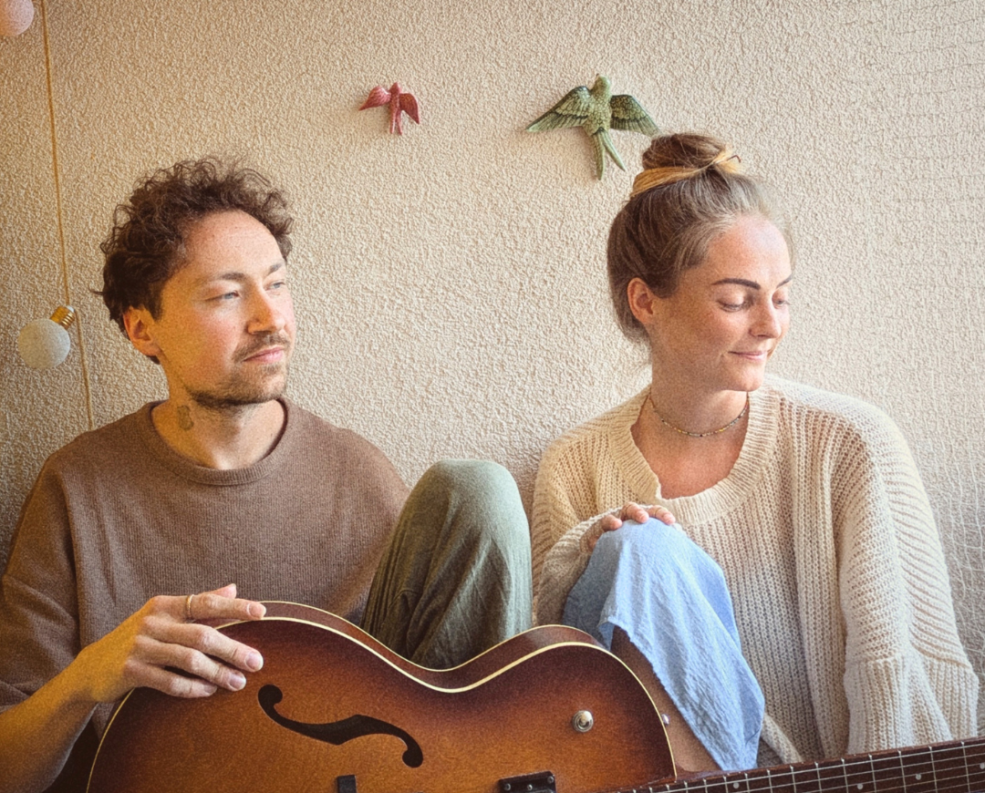 Sue Gerger and David Hättich performing acoustic duo at Hafenzwitschern street festival, Lendhafen Klagenfurt.